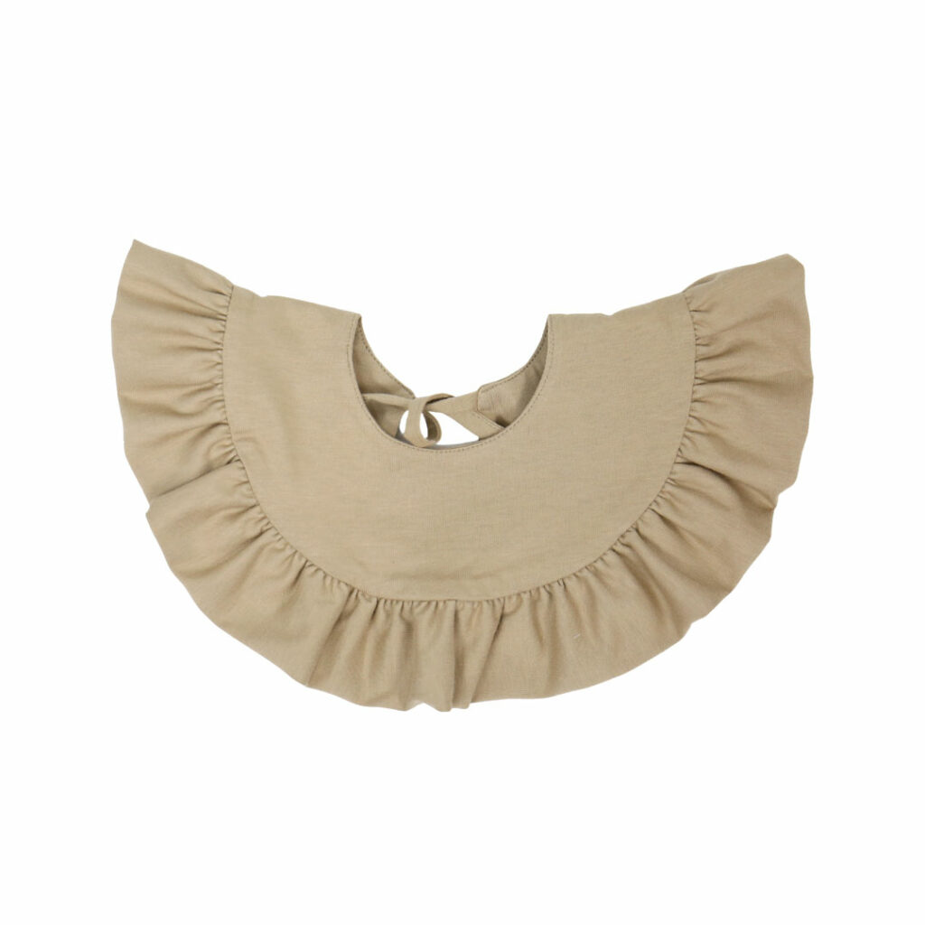 Dětský bavlněný bryndák s volánem Dětský bavlněný bryndák s volánem