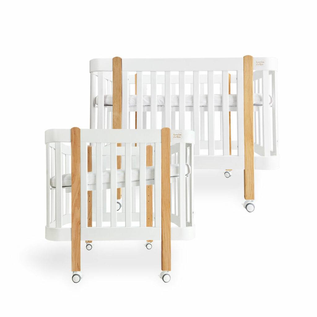Dětská antirefluxní rostoucí postýlka Nika Duo – bílá s dřevěnými nožičkami